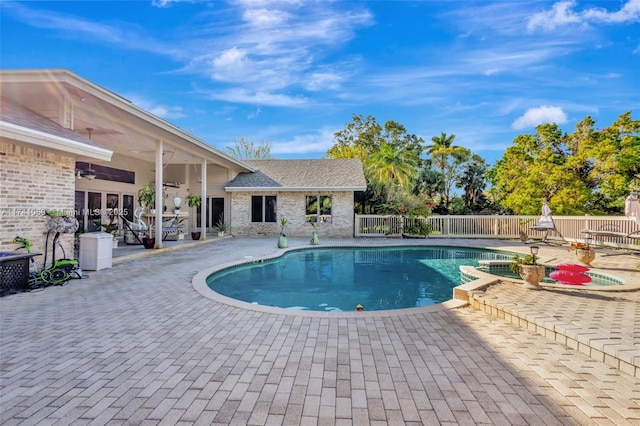 view of pool featuring a patio