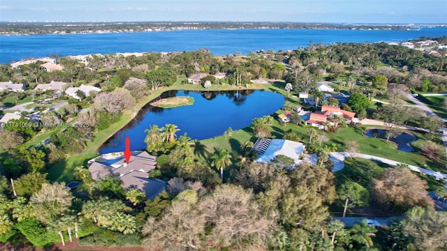 birds eye view of property featuring a water view