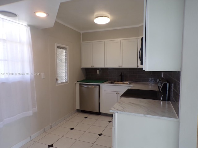 kitchen with backsplash, appliances with stainless steel finishes, sink, and white cabinets