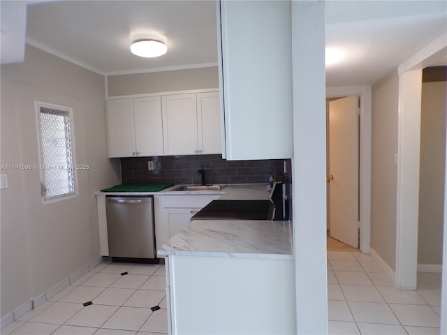 kitchen featuring sink, light tile patterned floors, white cabinetry, decorative backsplash, and stainless steel dishwasher