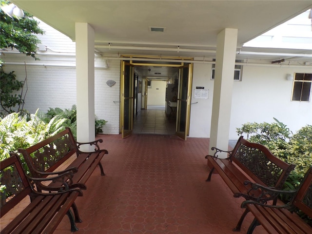 doorway to property with a porch