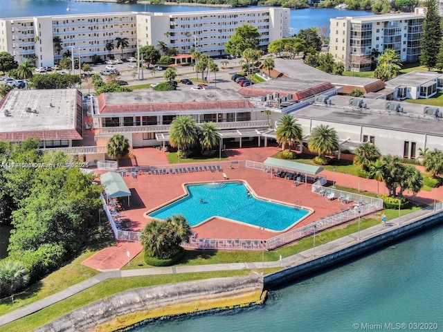 birds eye view of property featuring a water view