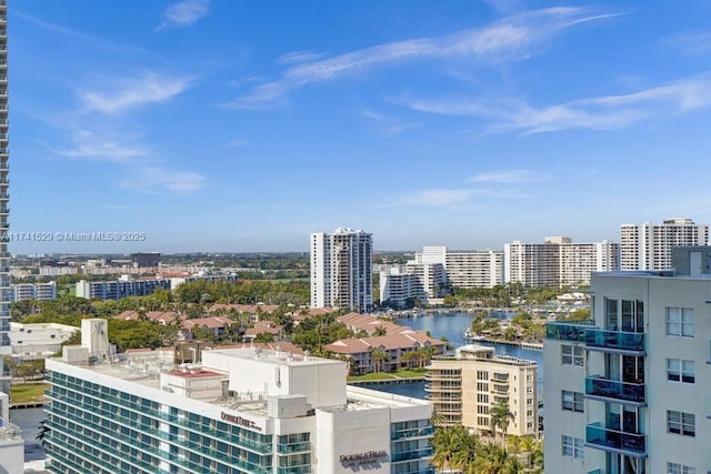 property's view of city with a water view