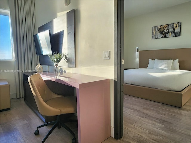 777 N Ocean Dr Unit S401, Hollywood, FL 33019 - bedroom featuring wood finished floors and multiple windows