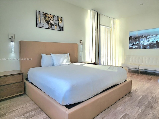 bedroom featuring light hardwood / wood-style flooring