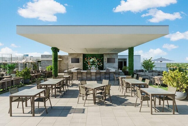 777 N Ocean Dr Unit S401, Hollywood, FL 33019 - view of patio with an outdoor living space and outdoor dry bar