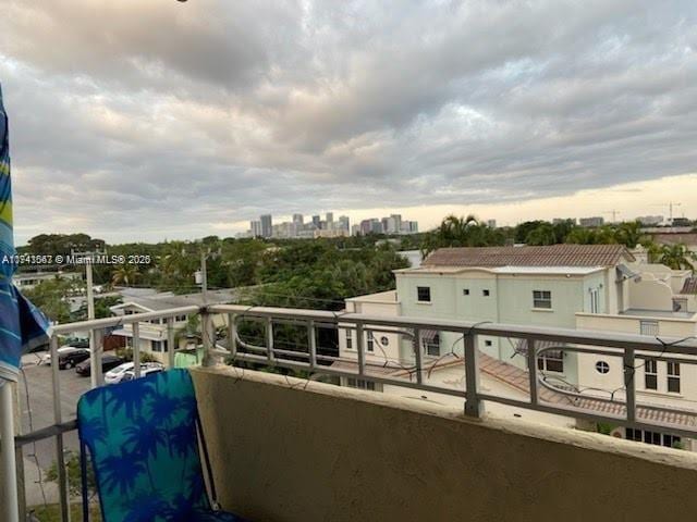 balcony featuring a view of city