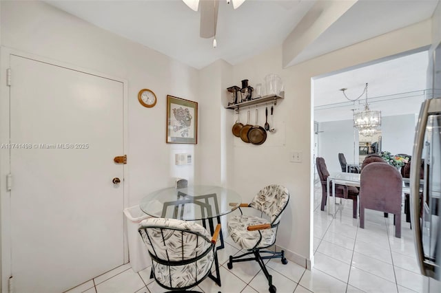 1985 S Ocean Dr Unit 22G, Hallandale Beach, FL 33009 - tiled dining area with ceiling fan with notable chandelier