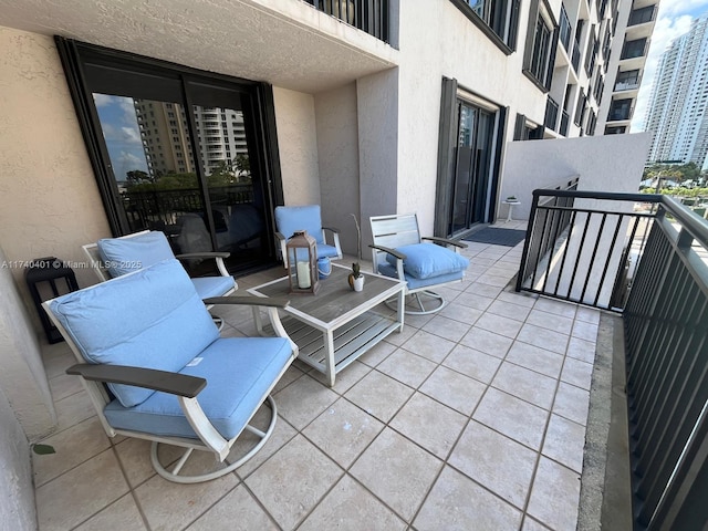 view of patio with a balcony