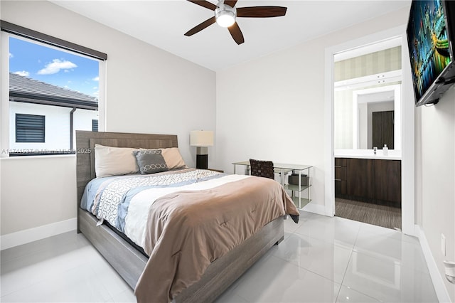 bedroom with connected bathroom and ceiling fan