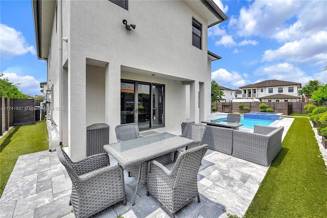 view of patio / terrace featuring a fenced in pool