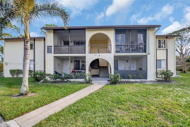 view of front of home with a front lawn