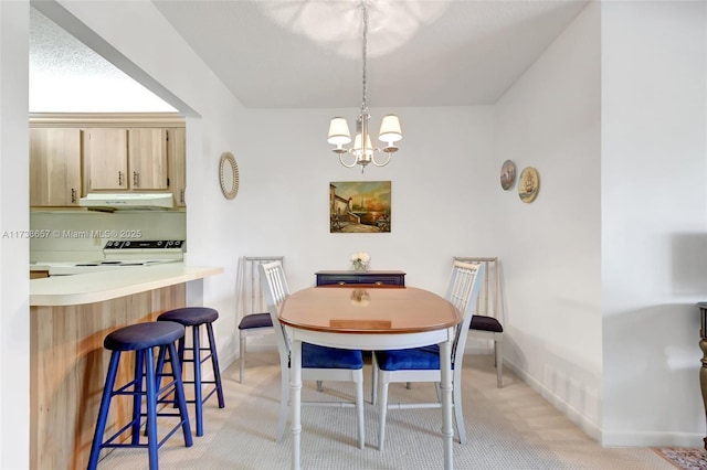 dining area with an inviting chandelier and light colored carpet