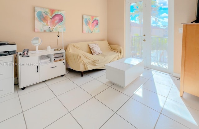 living room with light tile patterned flooring and french doors