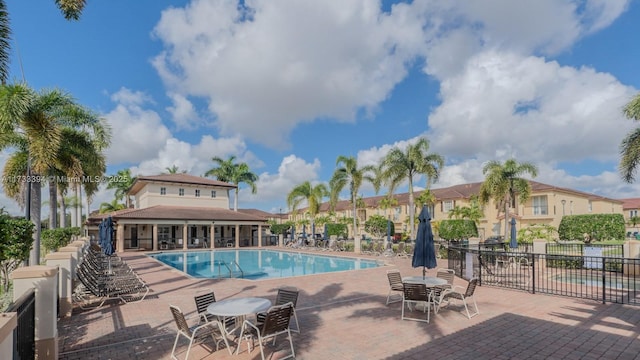 view of swimming pool featuring a patio area