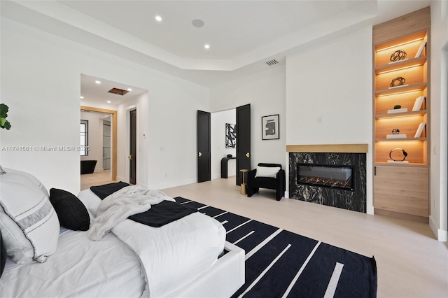 bedroom with a tray ceiling