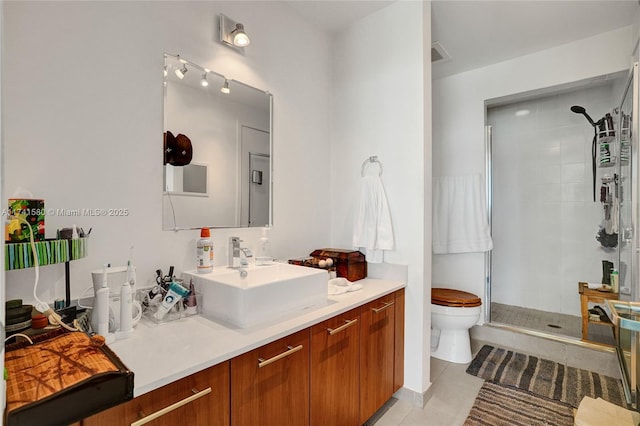 bathroom with walk in shower, vanity, toilet, and tile patterned flooring