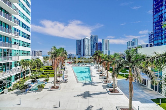 view of swimming pool featuring a patio