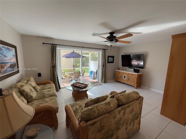 tiled living room with ceiling fan