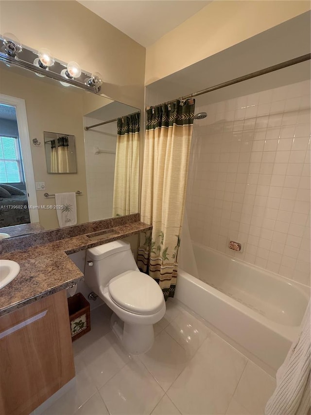 full bathroom featuring vanity, shower / tub combo, tile patterned floors, and toilet