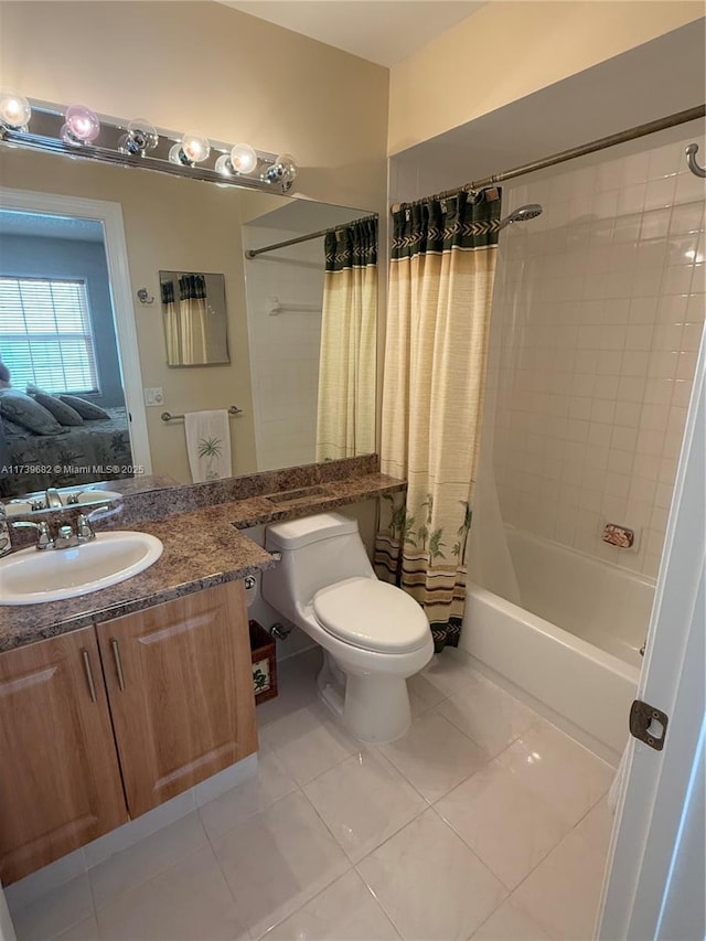 full bathroom with tile patterned floors, vanity, toilet, and shower / bath combo