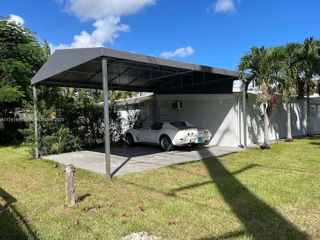 view of vehicle parking featuring a yard