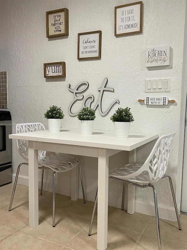 view of tiled dining space