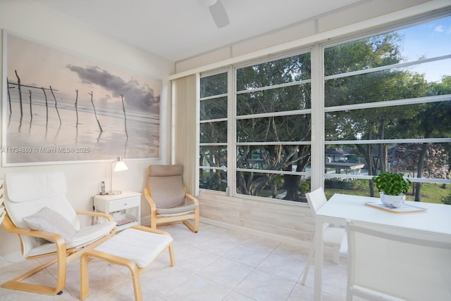 sunroom / solarium with ceiling fan