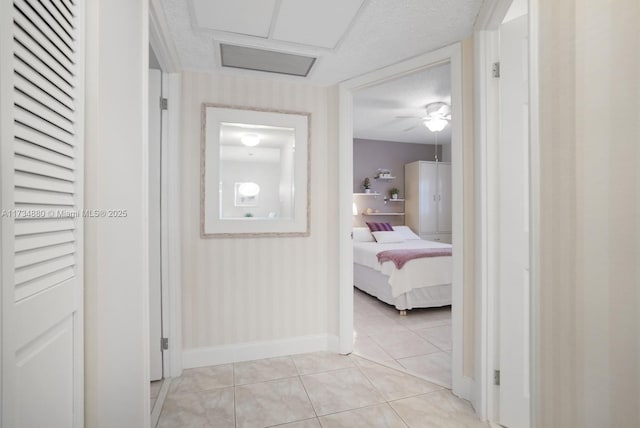 hallway with light tile patterned flooring