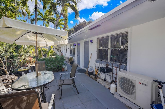 view of patio featuring ac unit