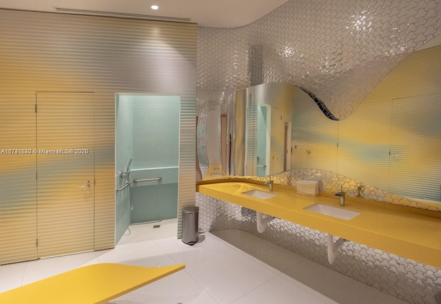 bathroom featuring tile patterned flooring and double sink