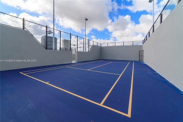 view of tennis court with basketball court