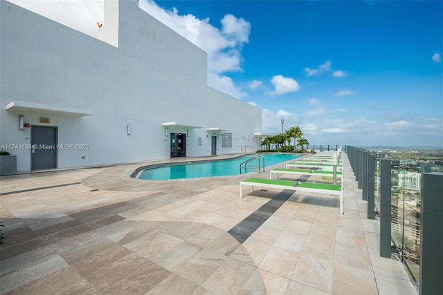 pool with a patio