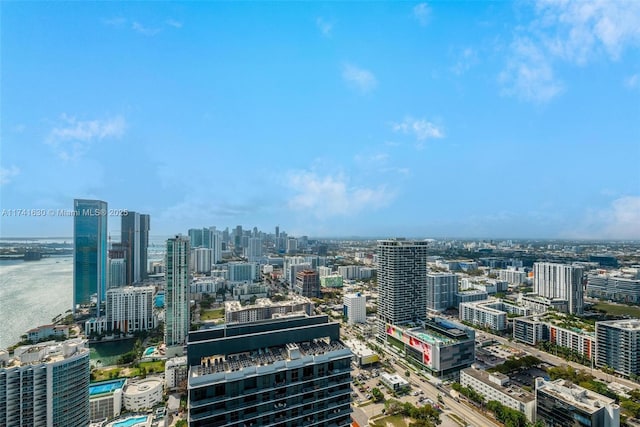 property's view of city with a water view