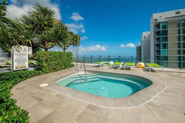 view of pool with a patio area and a swimming pool