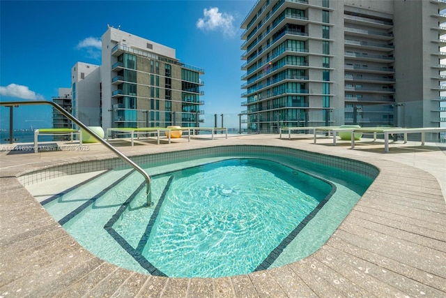 view of swimming pool featuring a patio