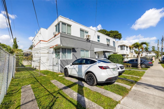 exterior space with a front yard