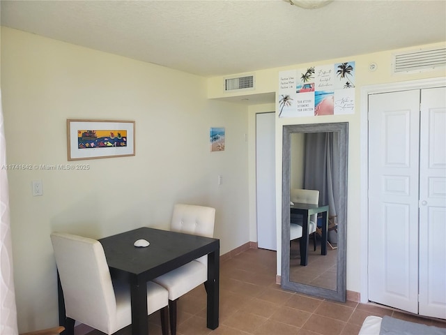 view of tiled dining space