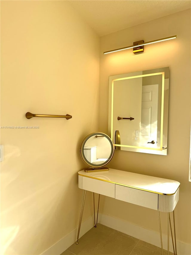 bathroom with baseboards