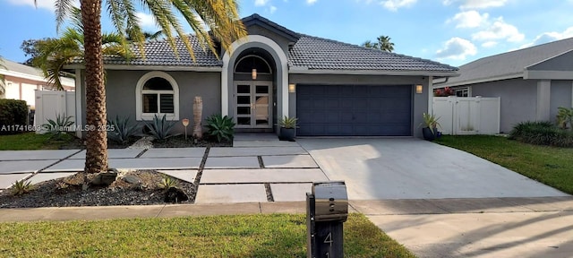 view of front of property featuring a garage