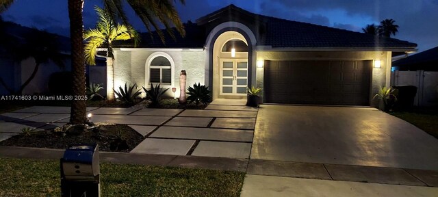 view of front of home featuring a garage