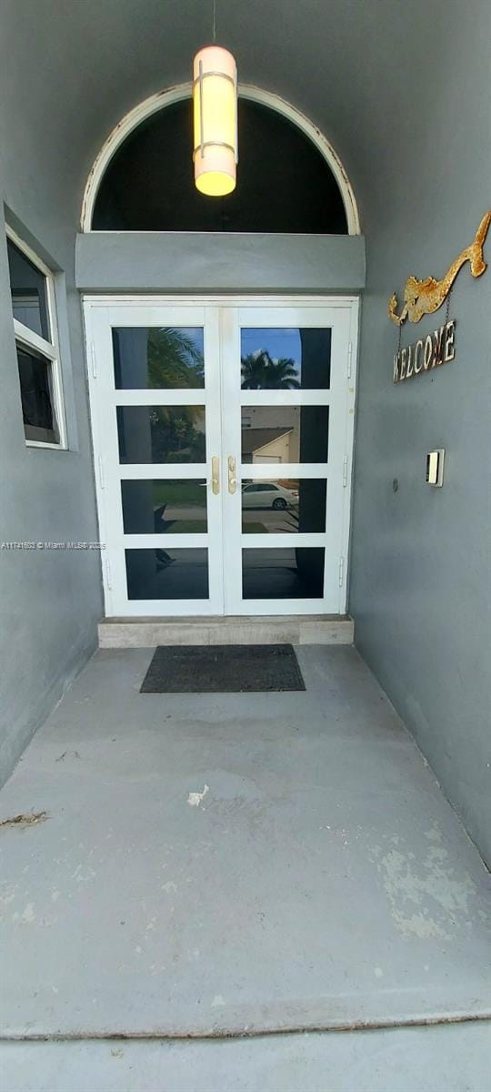 doorway to property featuring french doors