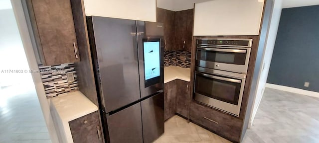 kitchen with dark brown cabinets and stainless steel appliances