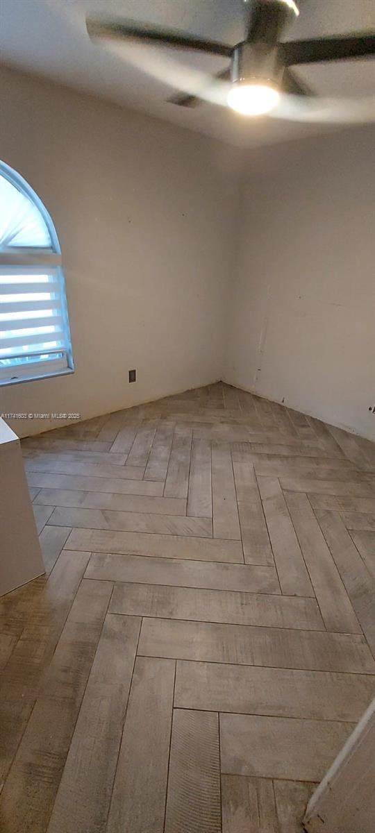 spare room featuring light parquet floors