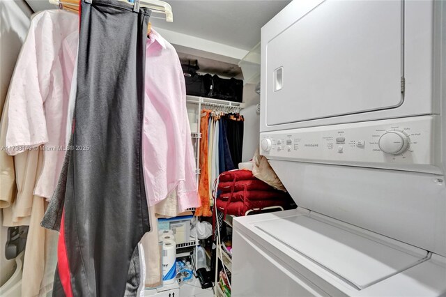 7368 Devon Dr Unit 301, Tamarac, FL 33321 - clothes washing area featuring stacked washer / dryer