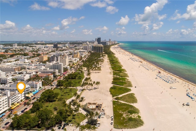 drone / aerial view with a view of the beach and a water view