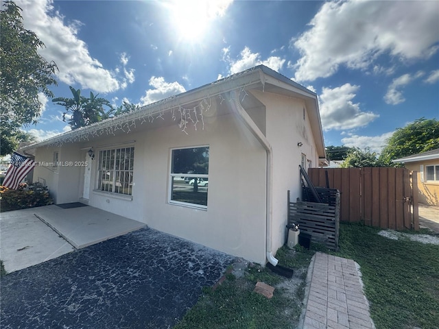 view of home's exterior featuring a patio