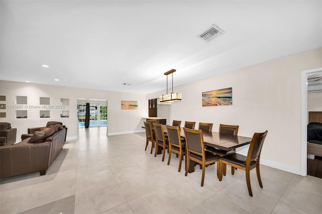 tiled dining area with french doors