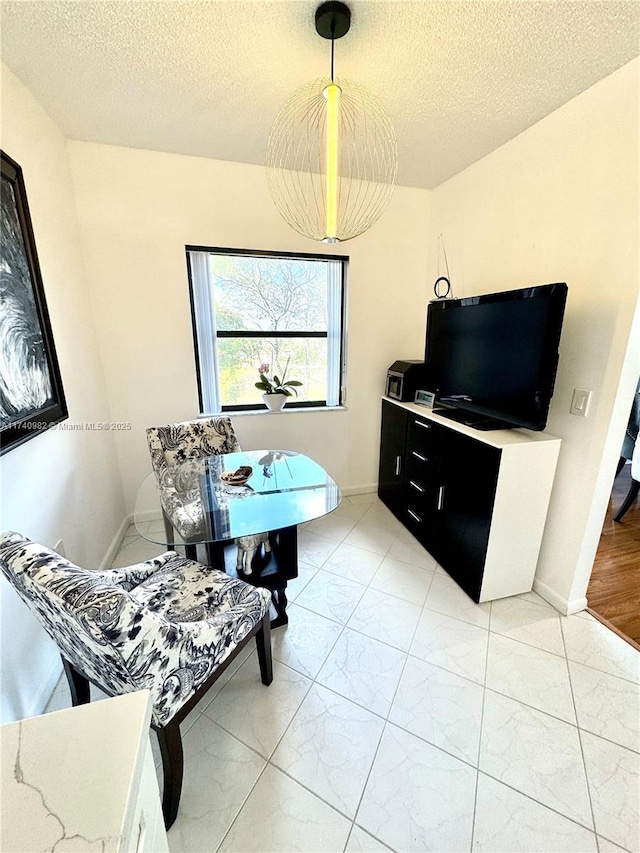 3850 Washington St Unit 317, Hollywood, FL 33021 - dining space featuring a textured ceiling