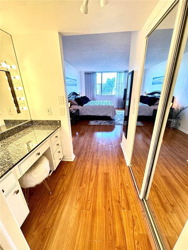 3850 Washington St Unit 317, Hollywood, FL 33021 - hallway with light wood-type flooring